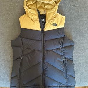 Women’s North Face vest, black and gold, size Large